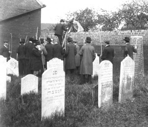 Climbing the far wall of the Jewish Cemetery